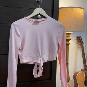 INFINITE PERFORMANCE PINK GYM CROSS TOP